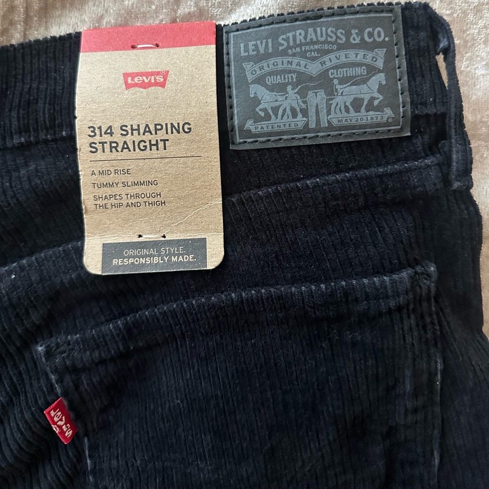 Levi’s 314 black corduroy straight legs pants. Tummy control and shaping